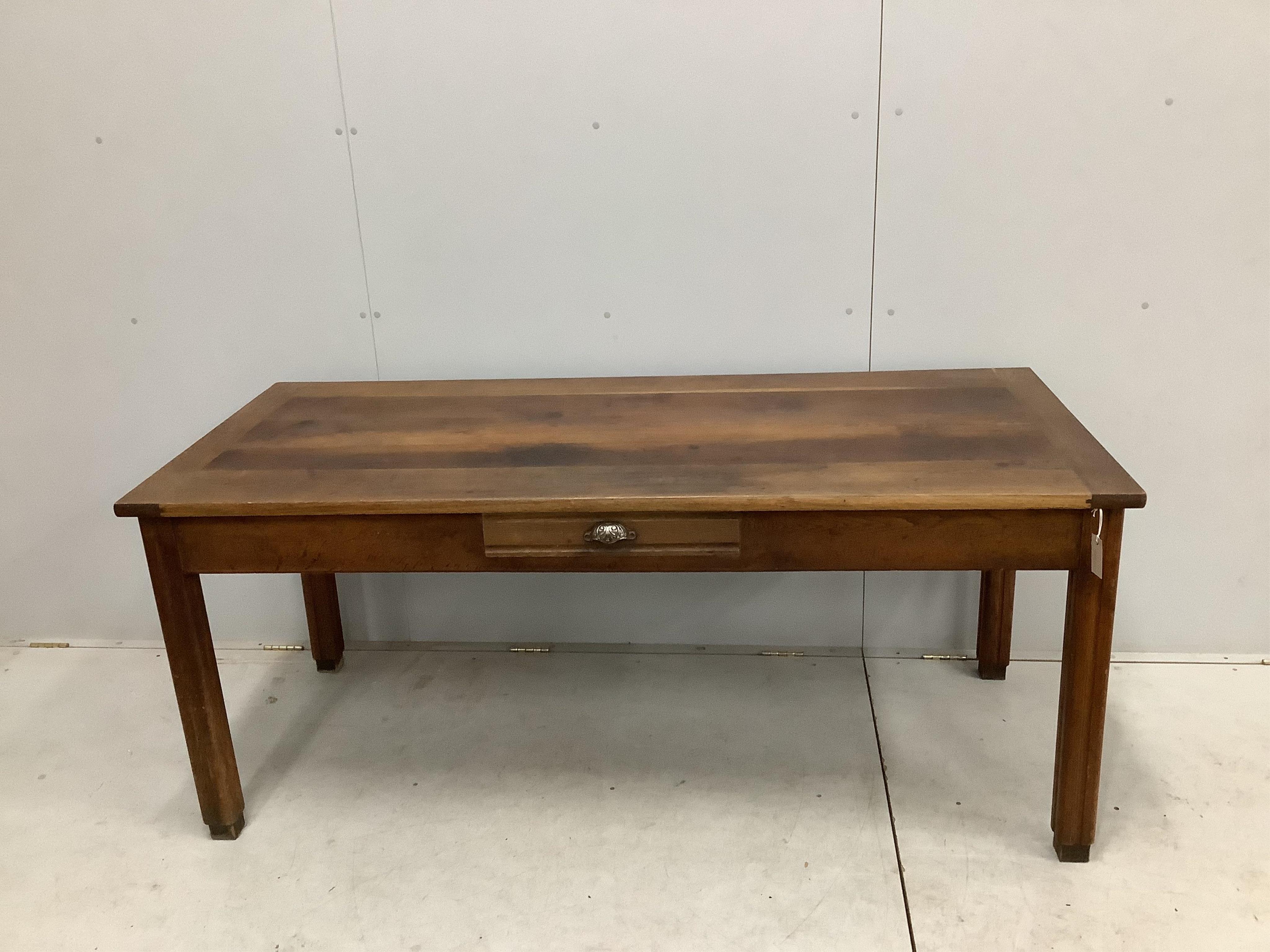 A French rectangular oak farmhouse kitchen table with detachable extension leaves and a single drawer, width 179cm, 277cm extended, depth 79cm, height 77cm. Condition - fair to good